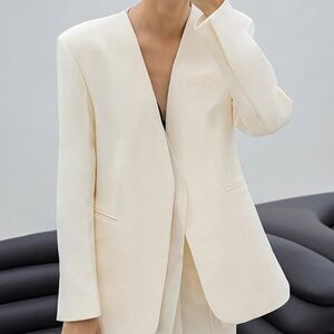 Stylish blazer cream color. For work,office, the date, casual. Suit jacket